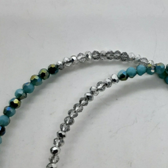 A PAIR of memory wrap cuff bracelets - Picture 2 of 4